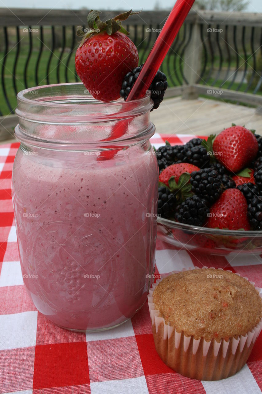 Healthy Picks. Berry smoothies with fresh strawberries and blackberries. 