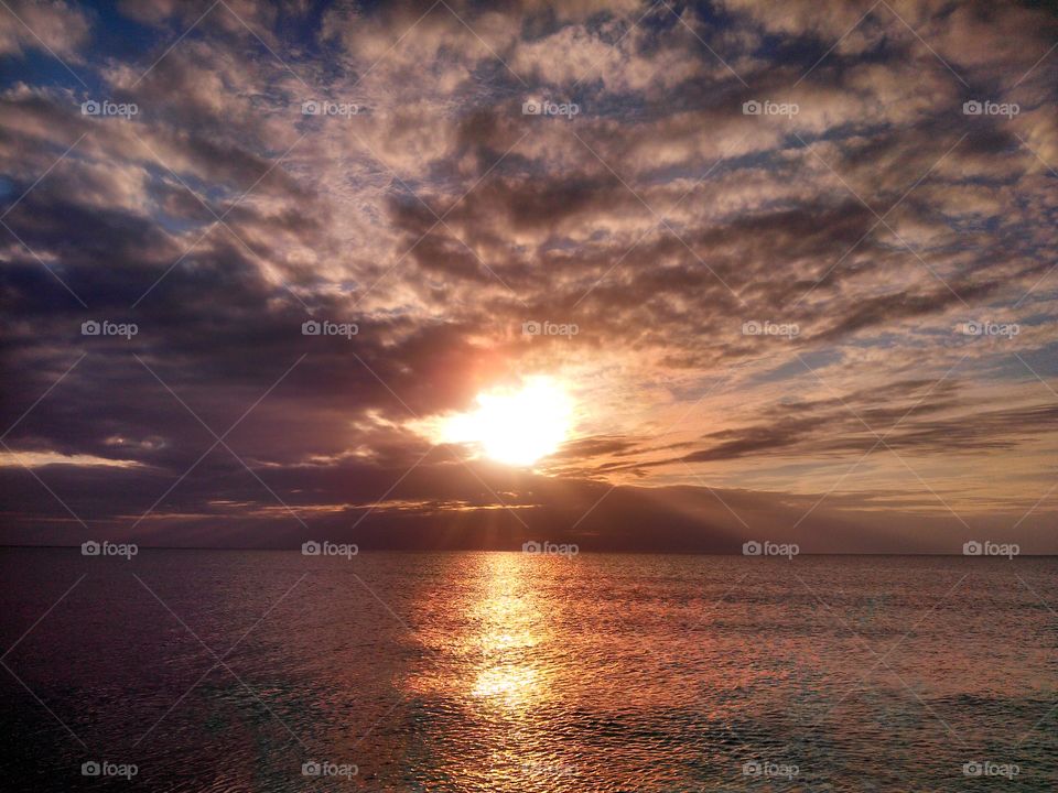 Beautiful sunset on the ocean with a spectacular sky