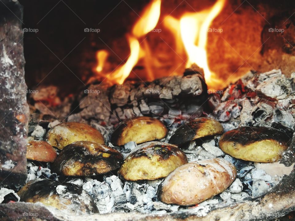 Lovely, cooked potatoes in fire!