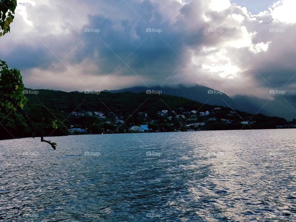 Scenic view of sea against cloudy sky