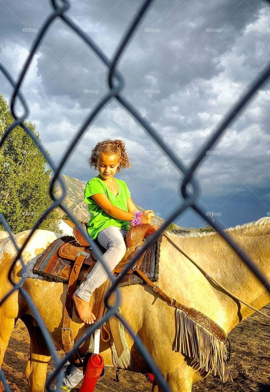 Another photo of my wonderful daughter, more recent than the others. Horseback riding and enjoying herself very much! Its much more obvious here that she's a biracial beauty,  and I have more of her in my collection. This lovely lady,  Miss Alaina,  is often featured in my work.