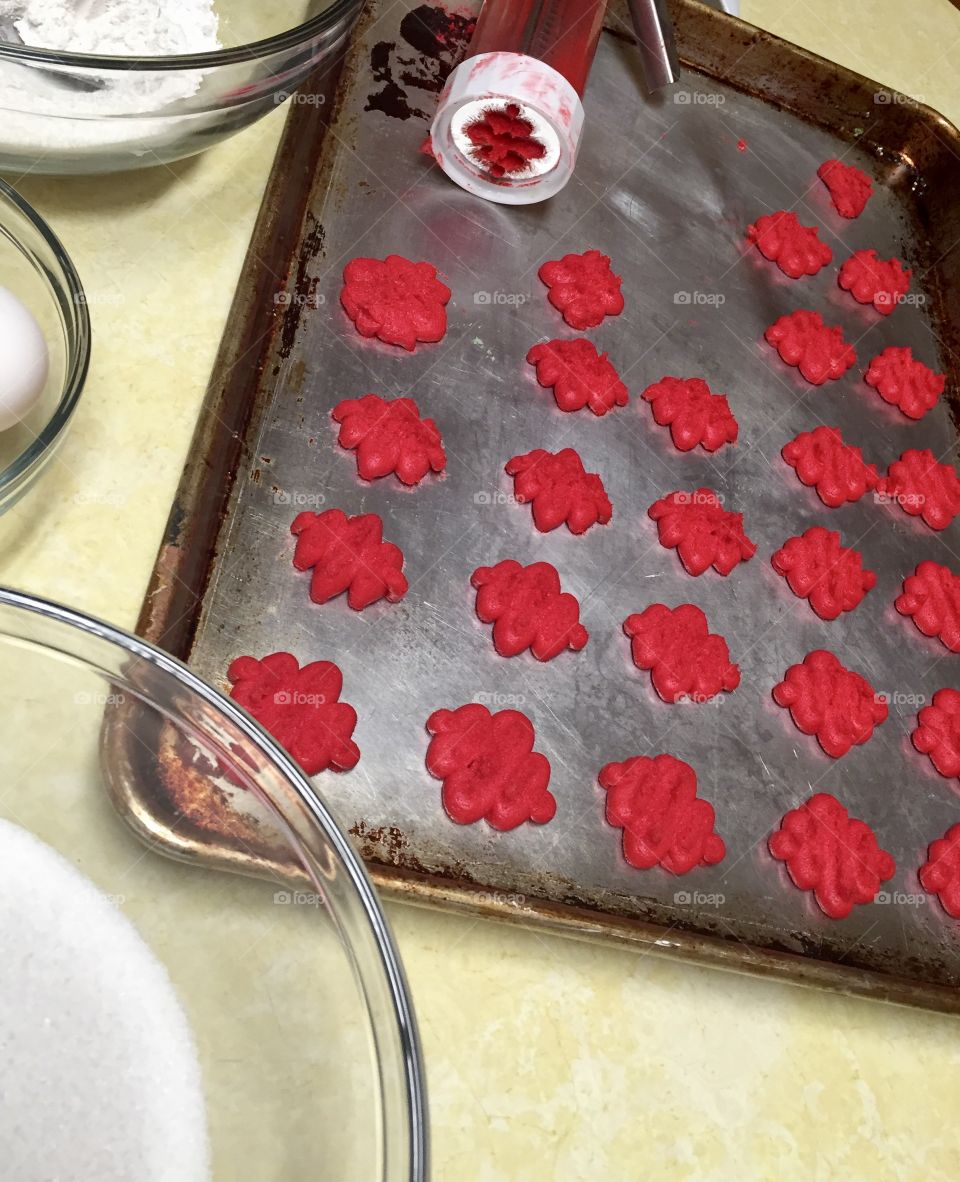 Making red holiday cookies 