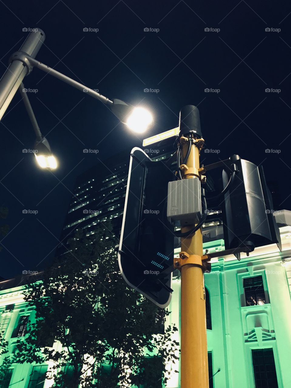 Night view with green illumination in the city.