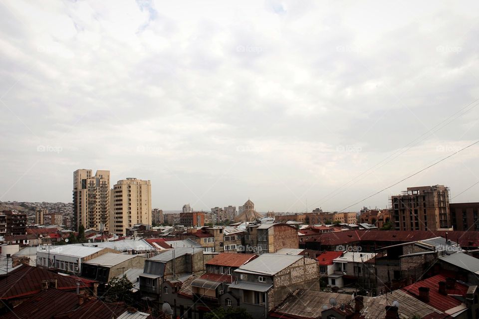 Balcony view over residential district in Yerevan, capital of Armenia, on a cloudy summer day