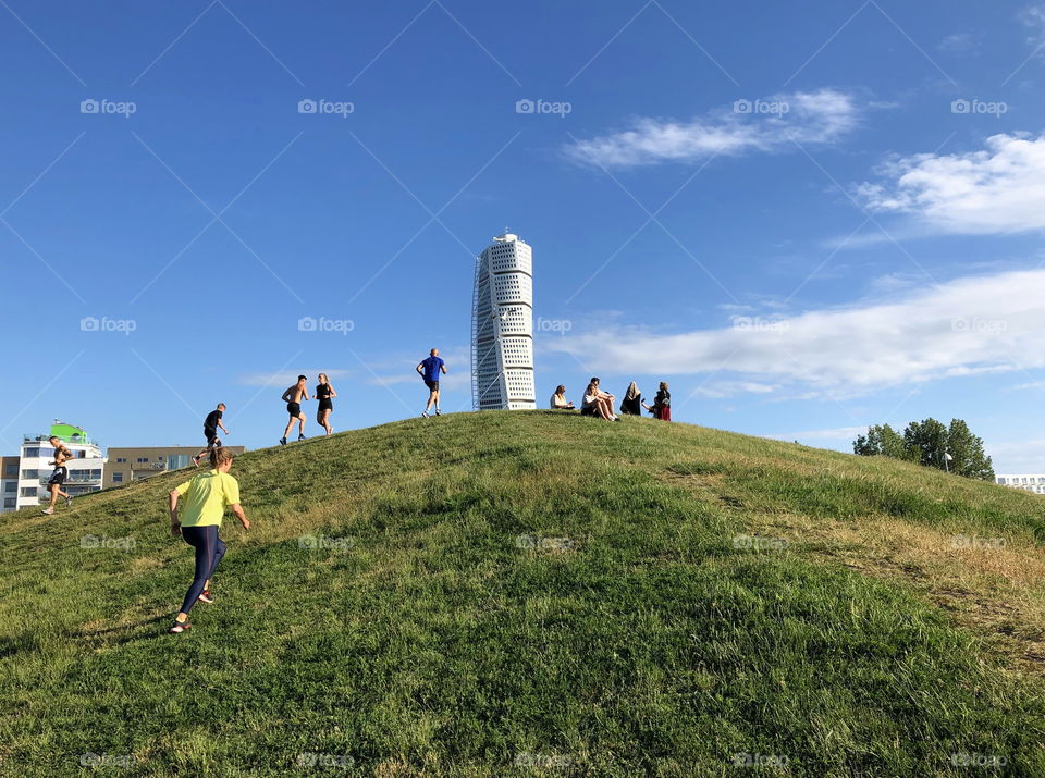 Exercising outdoors, covid, distance, Malmö turning torso