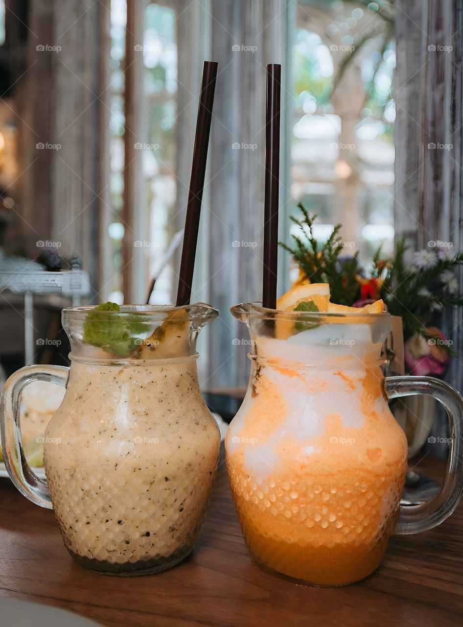 Dragon fruit, orange juice, fruit juice on the table