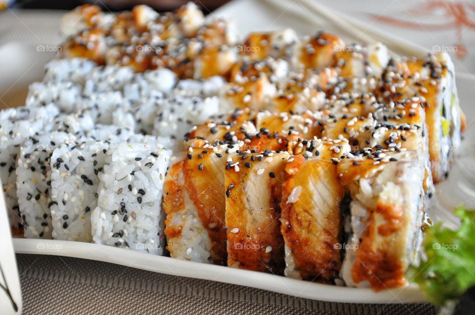 Close-up of sushi rolls in restaurant