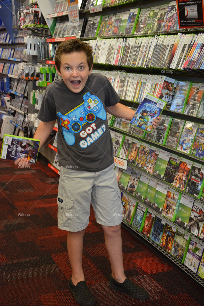 Boy holding books in hand