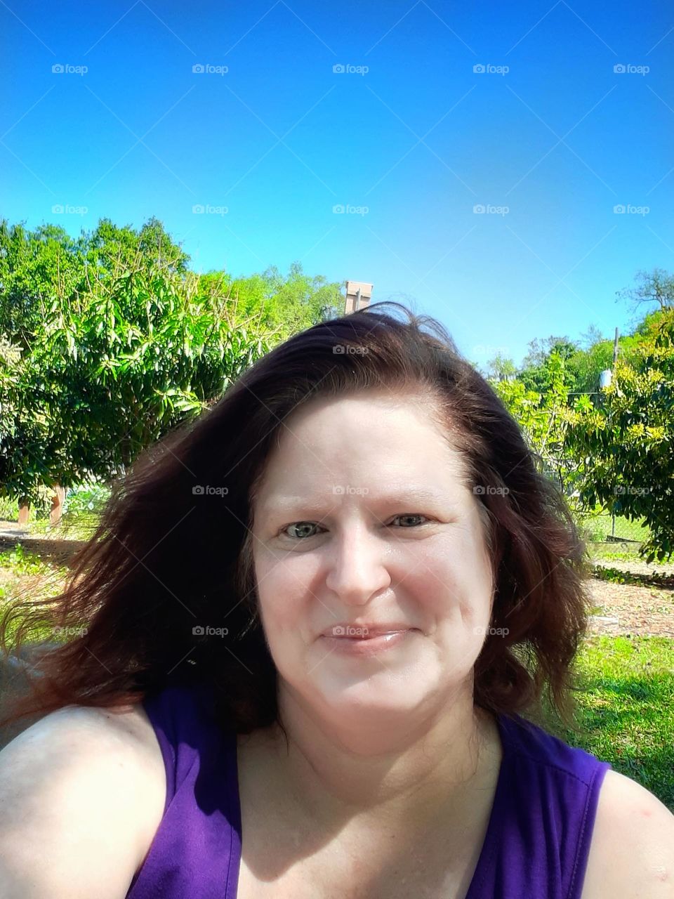 A selfie I took of me at Greenwood Urban Wetland in Orlando, Florida. It was a beautiful and windy day.