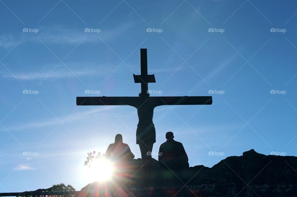 Beautiful view of the cross with the sunset