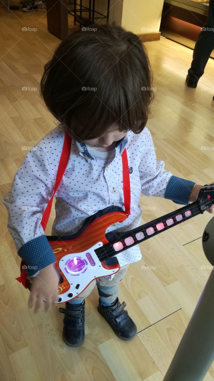 🎸🎶My little rocker brother with his super guitar