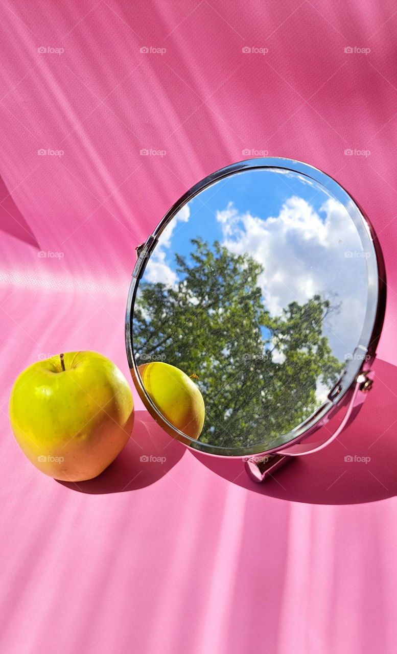 mirror and apple