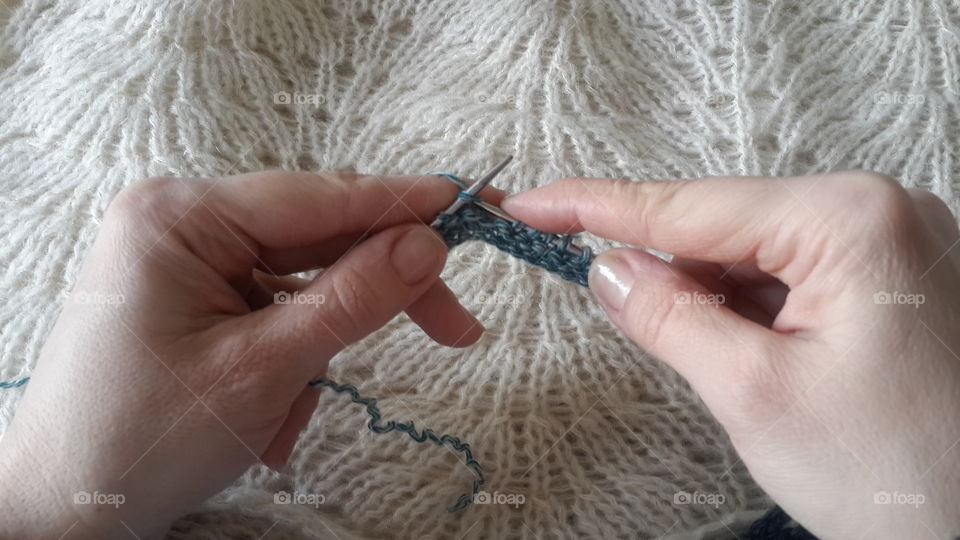 Close-up of hand knitting