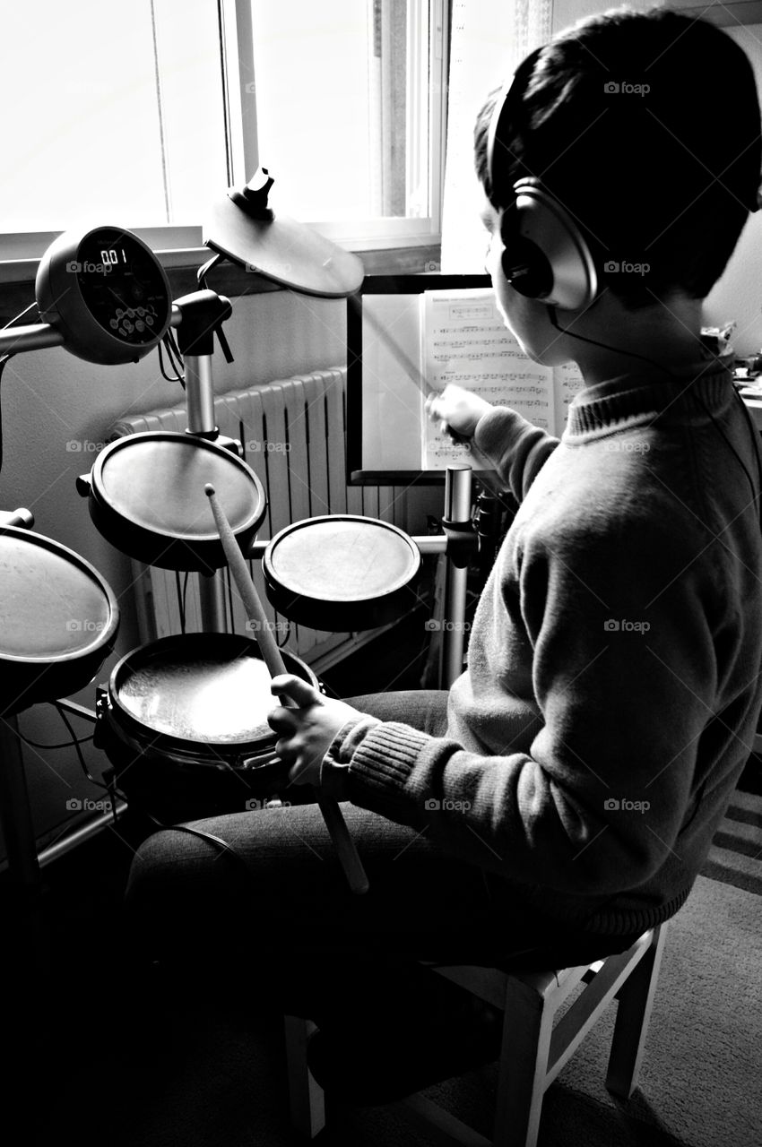 Young drummer. Young drummer practising