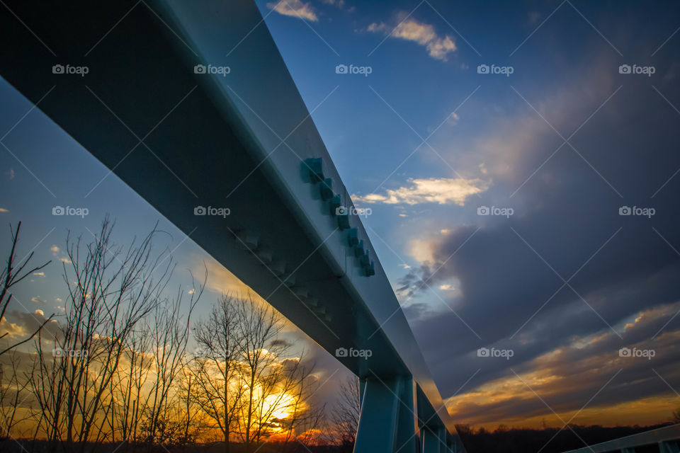 Low angle view of bridge at dusk