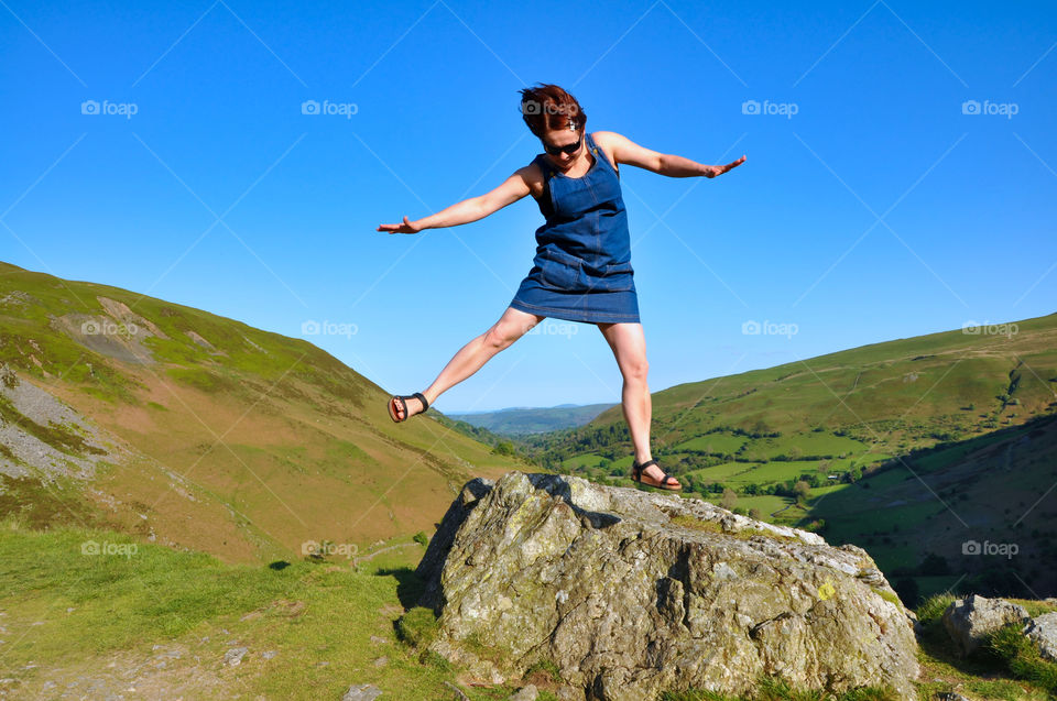 Girl jumping for joy.