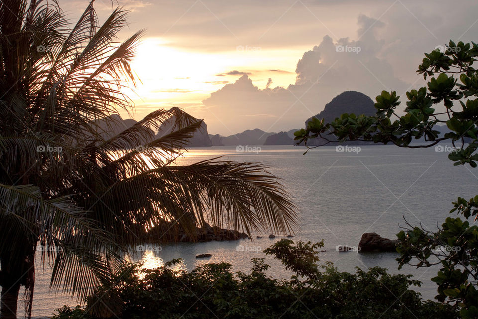 sunset water rain cloud by nautiflyer