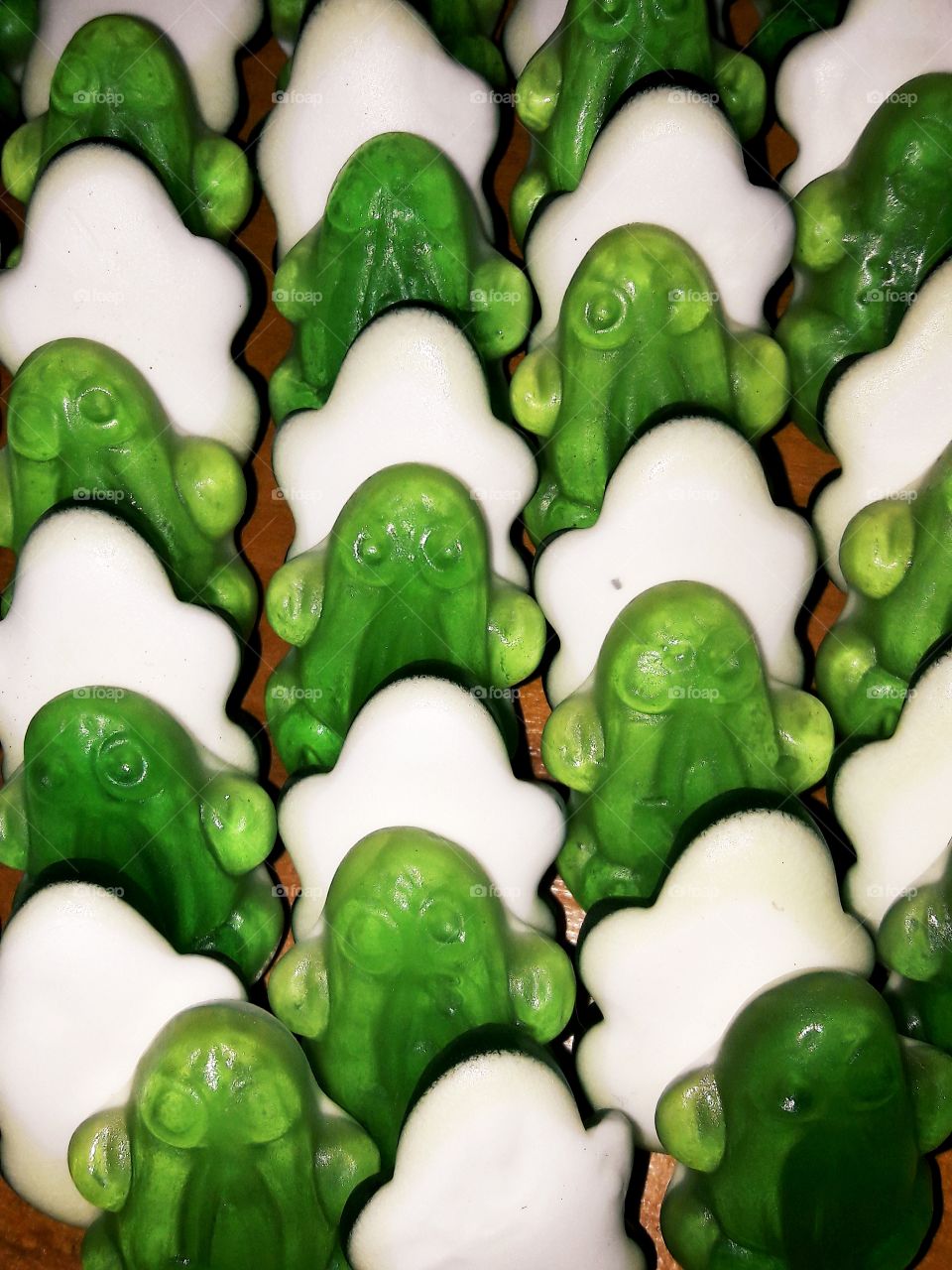 green frog candy in line