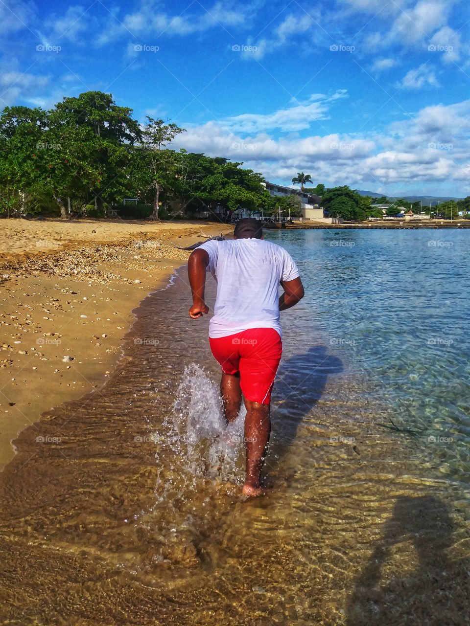 Man Running on the Beach