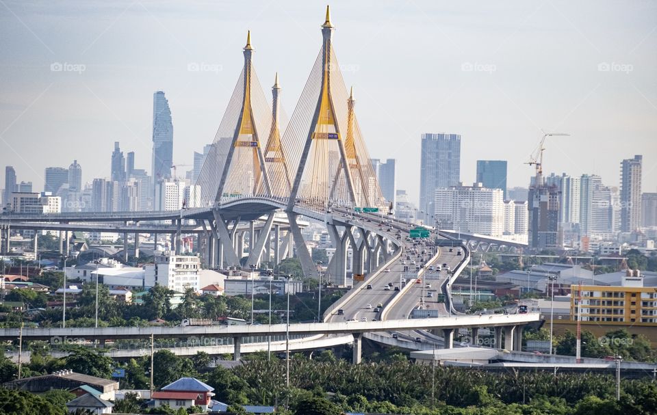 Road Leading line to the rule of thirds of beautiful contrast color landmark bridge of Bangkok Thailand