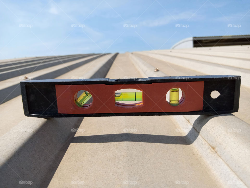 Spirit Level Old condition, placed on the sheets metal roof.