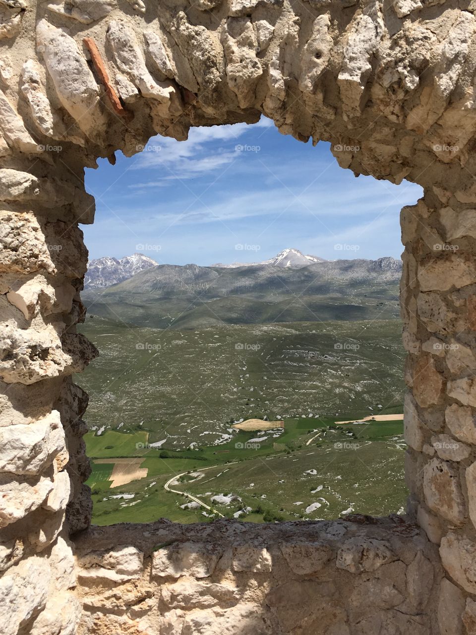 View of a mountain through window