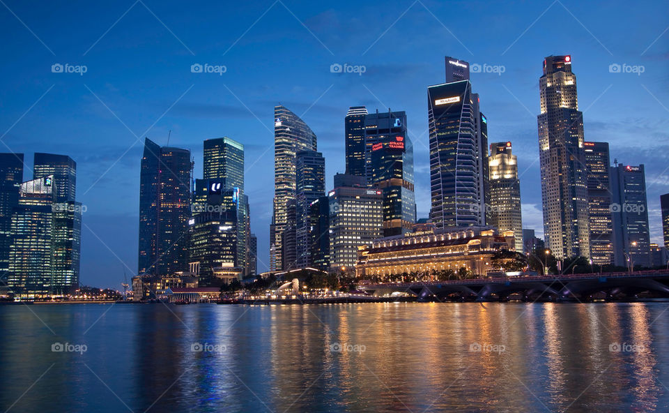 singapore water skyline reflection by nautiflyer