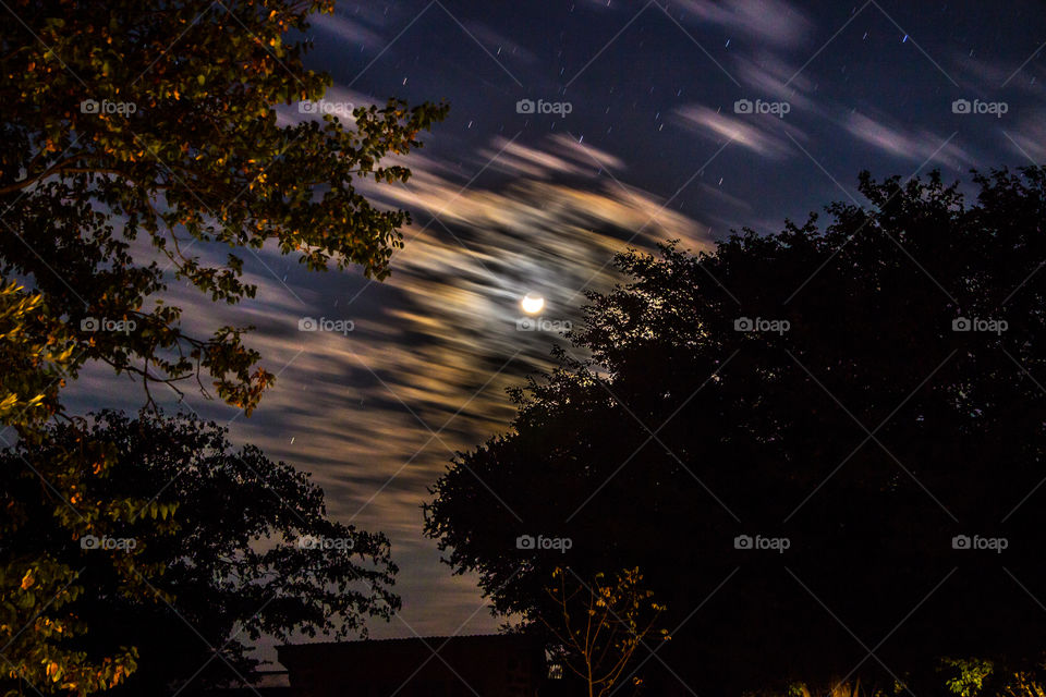 moon and moving clouds at night