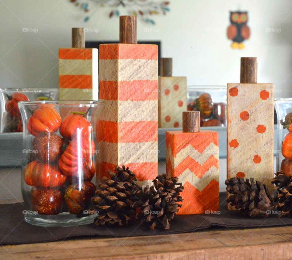 My Fall DYI project. A vase with gourds and colorful storage boxes.