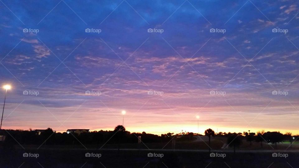 sky at sunset over slat cityscape