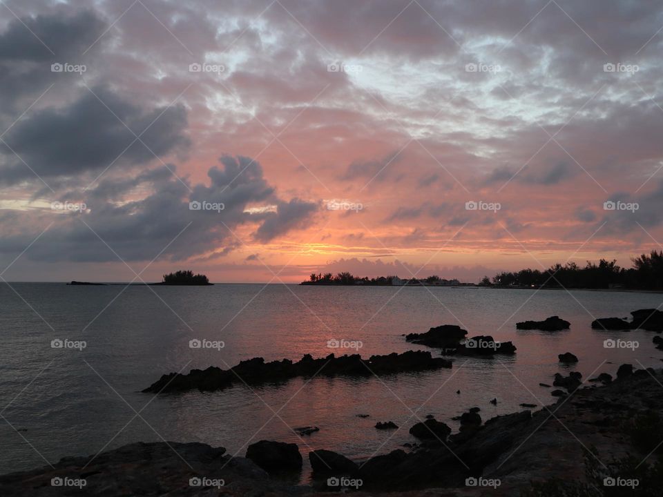 Colorful sunset with rocks