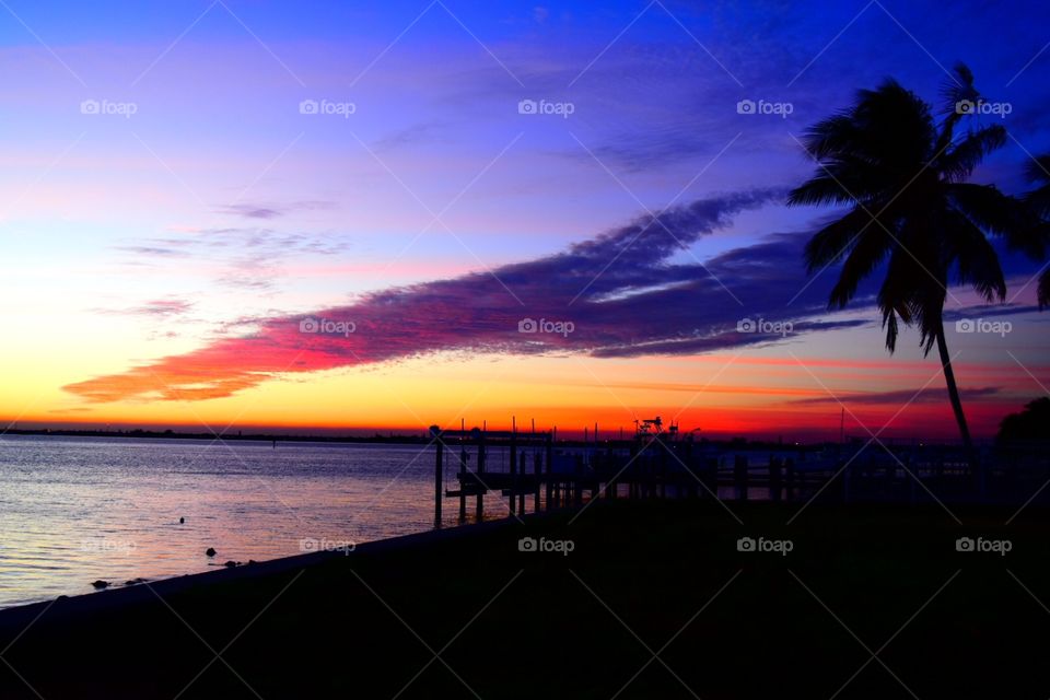 The colorful sunset, taken from a dock in the florida keys
