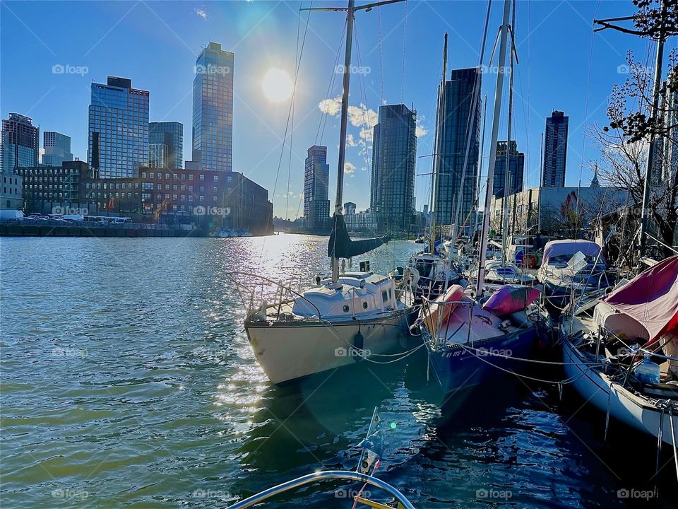 This is beautiful “Newtown Creek” by the “Pulaski Bridge” in LIC, Queens with its many boats seen from “Salvation”, the “28 ft 1969 Luhrs” cabin cruiser that I and my partner “Timothy Trespas” call home. 2024. Hypnotic Productions