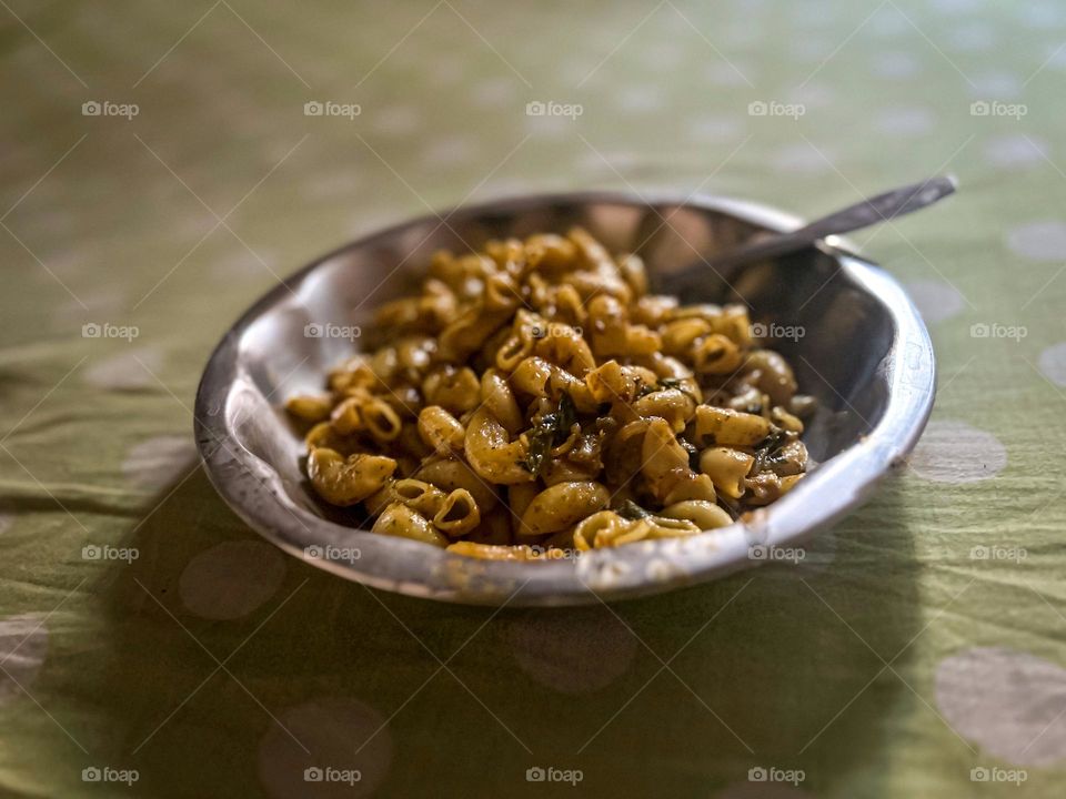 Bowl of cooked macaroni pasta 