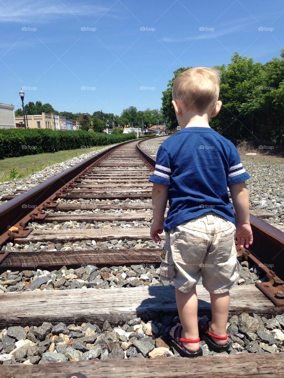 Train tracks and kid 