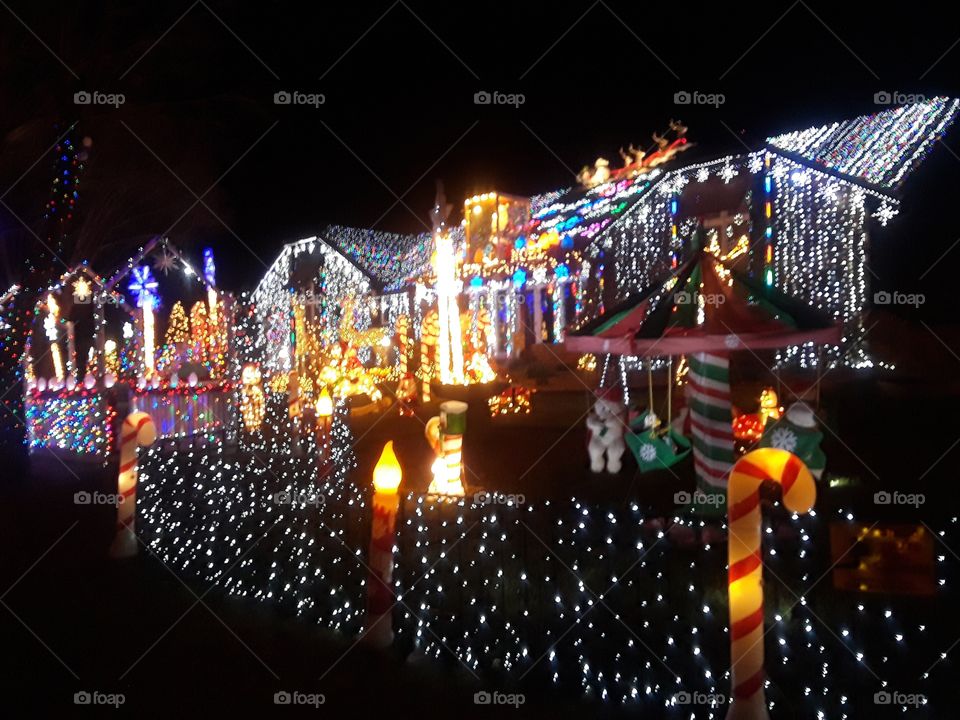 House Christmas Light Yard Display With Carousel