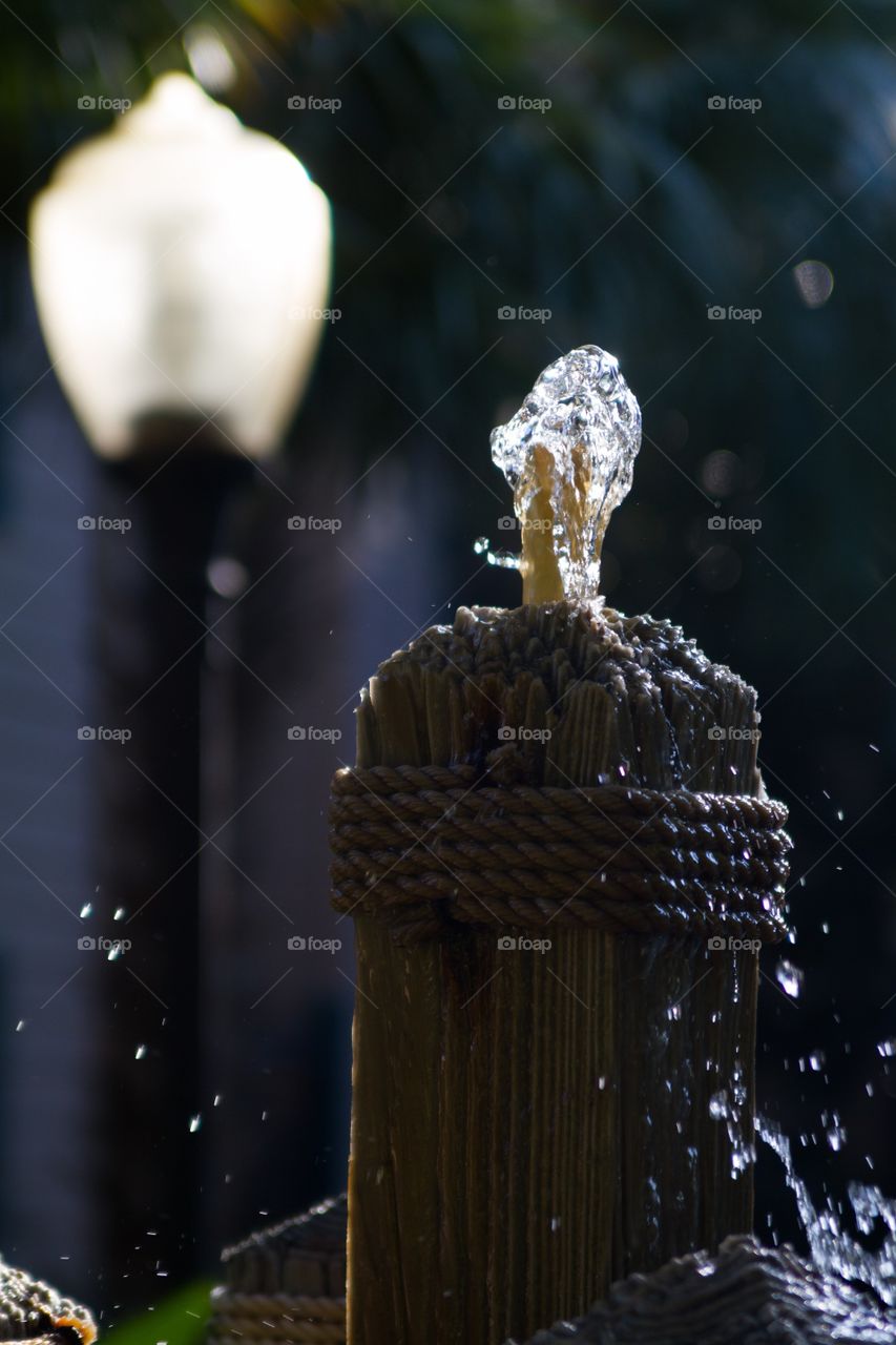 Water feature with street lamp