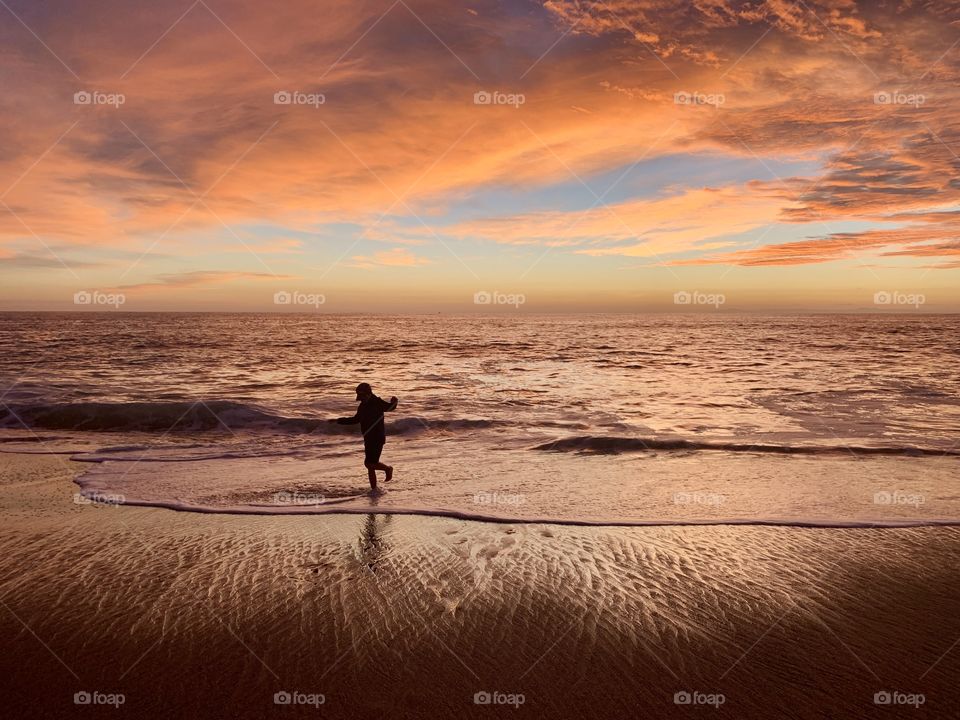 Frolicking sling the shoreline