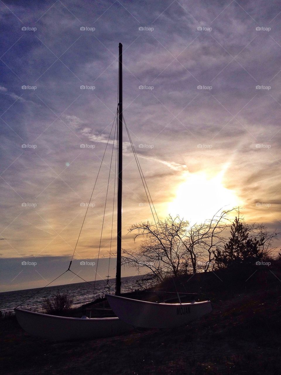 Catamaran on the beach in Autumn sun