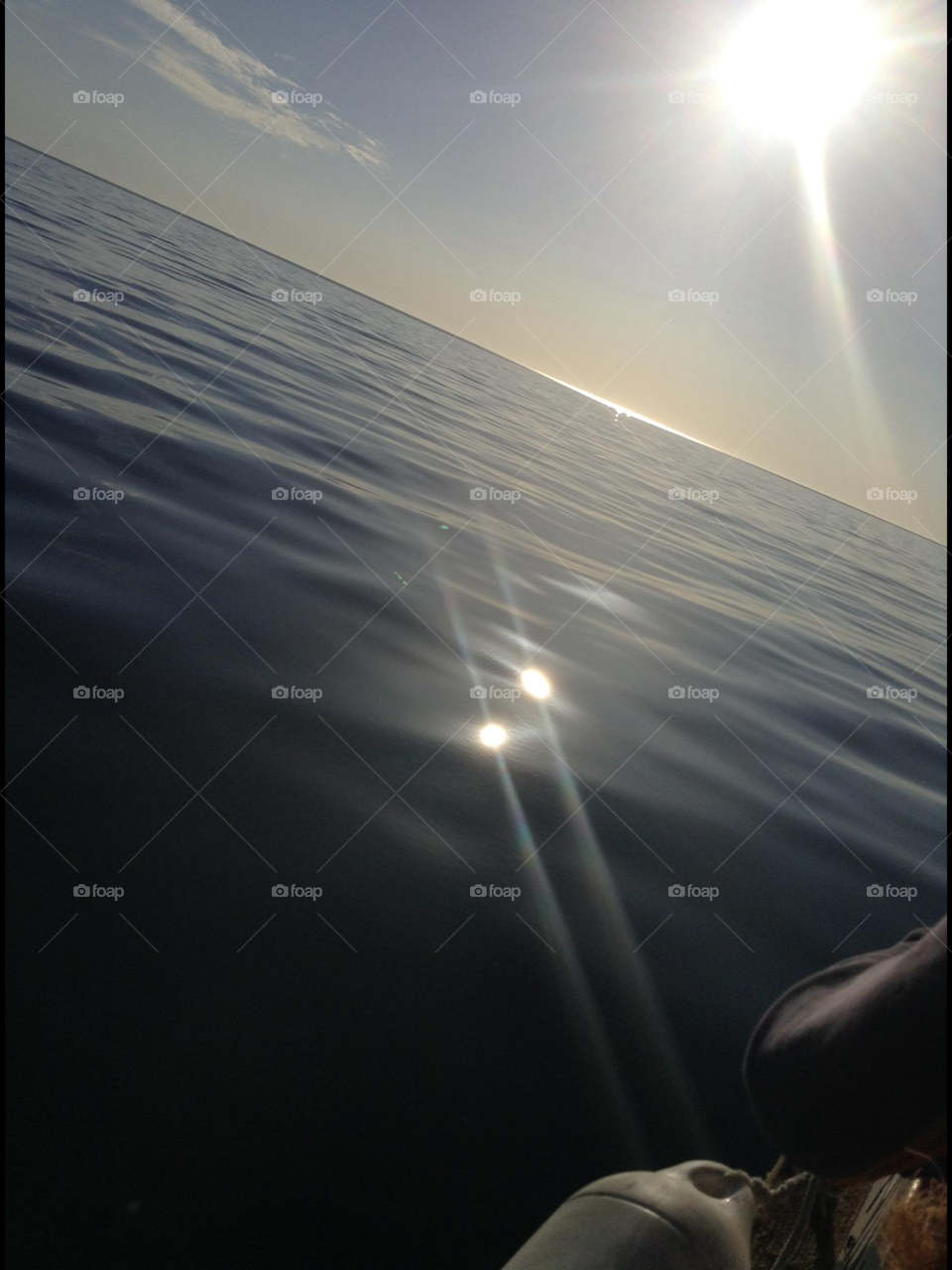 Reflection two Suns. Reflection from a boat creating two Suns in the algarve
