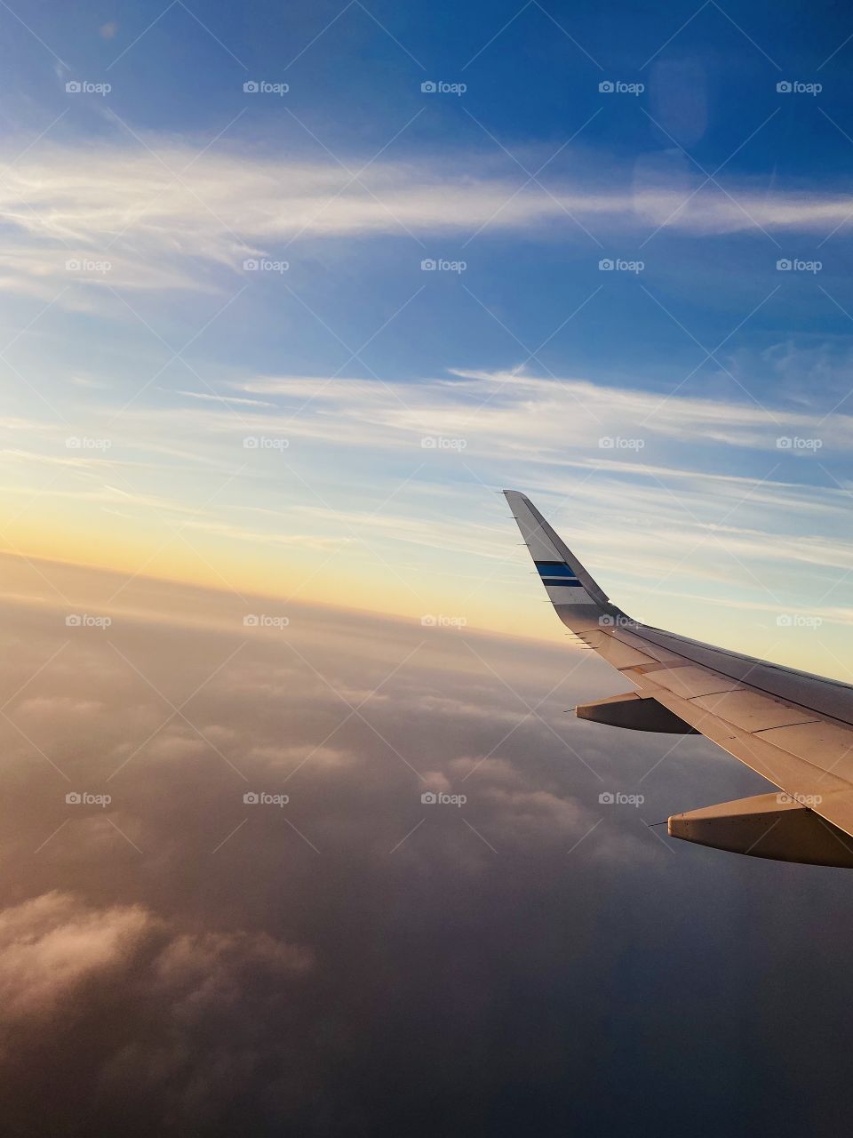 Up in the sky.. above and clouds.. flying high.. 