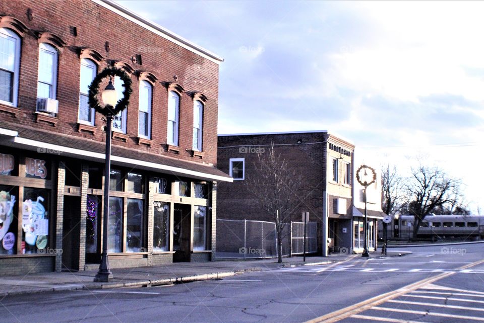 Abandoned Street by Train Tracks in Town