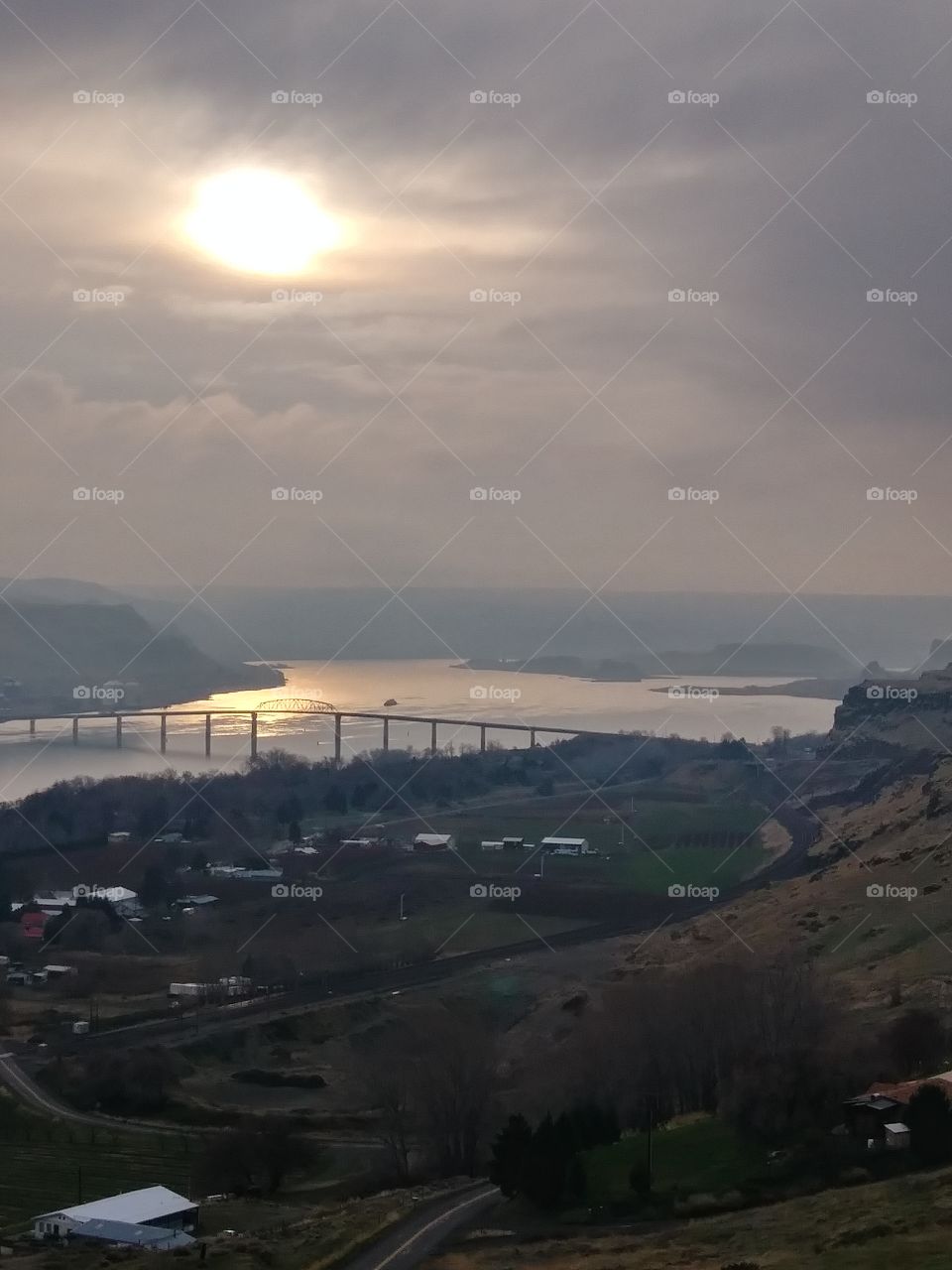 river and bridge at sunset