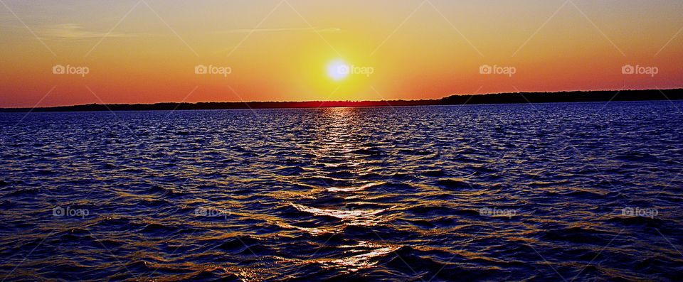 Sun's reflection on lake