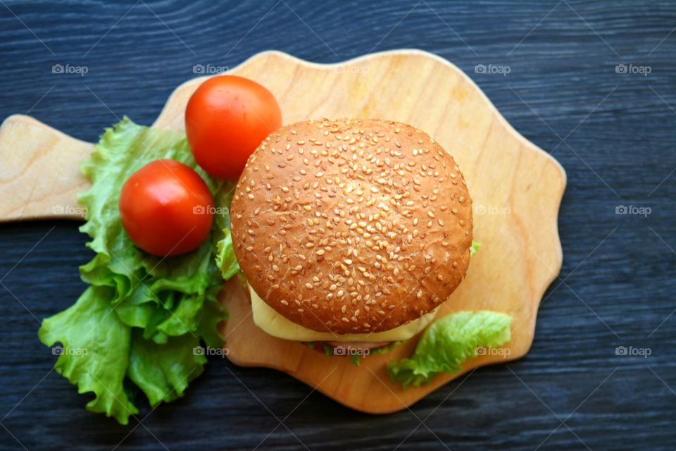 High angle view of burger with tomato