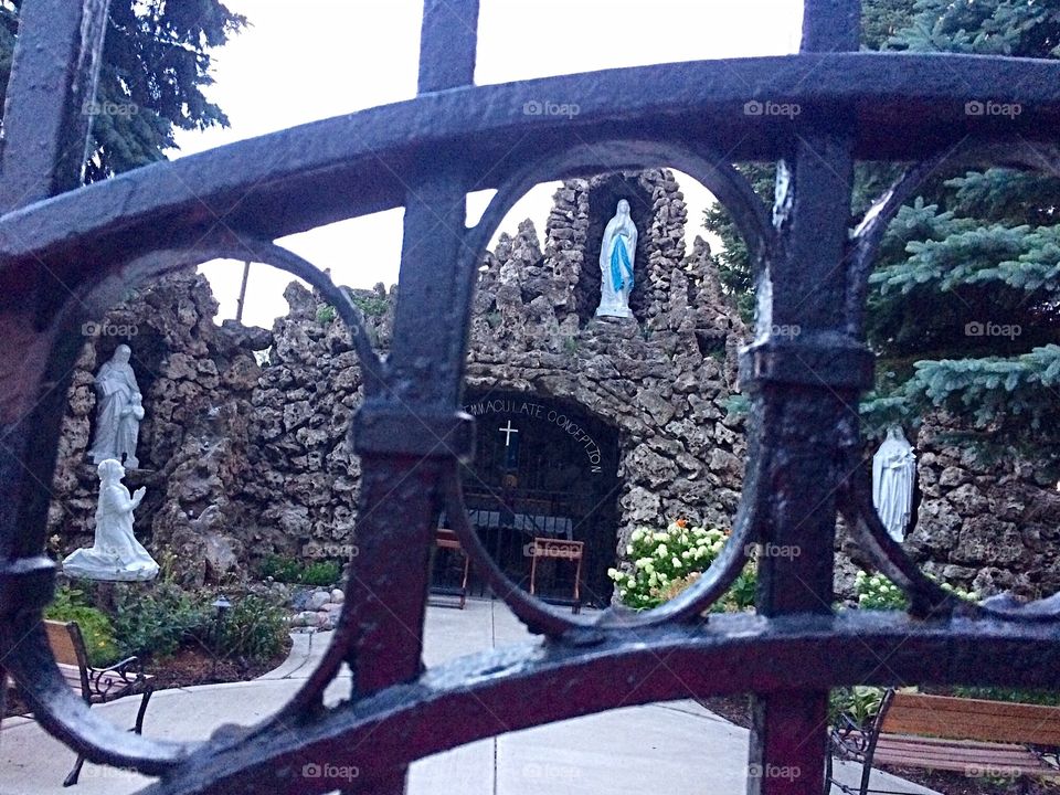 Looking through the gate at the grotto 