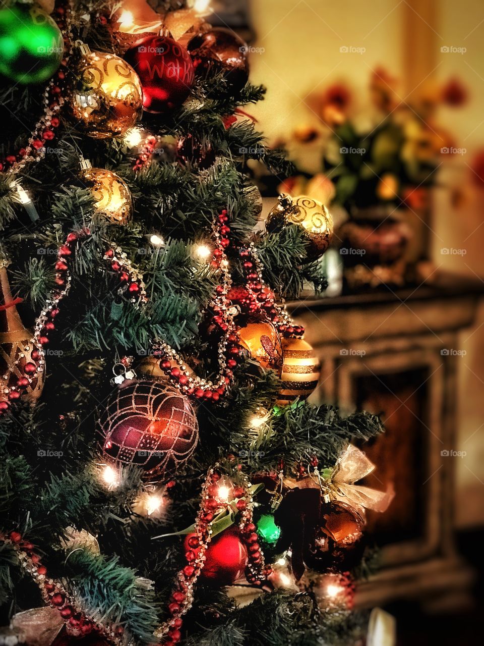 Close-up of Christmas ornaments on the tree
