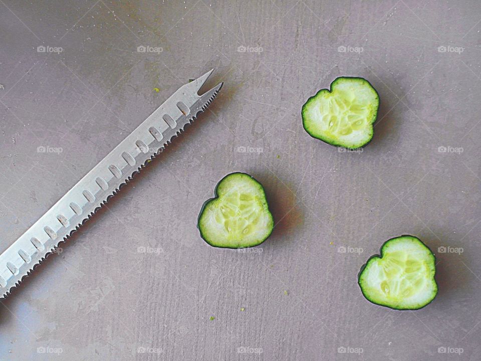 Cucumber hearts with knife