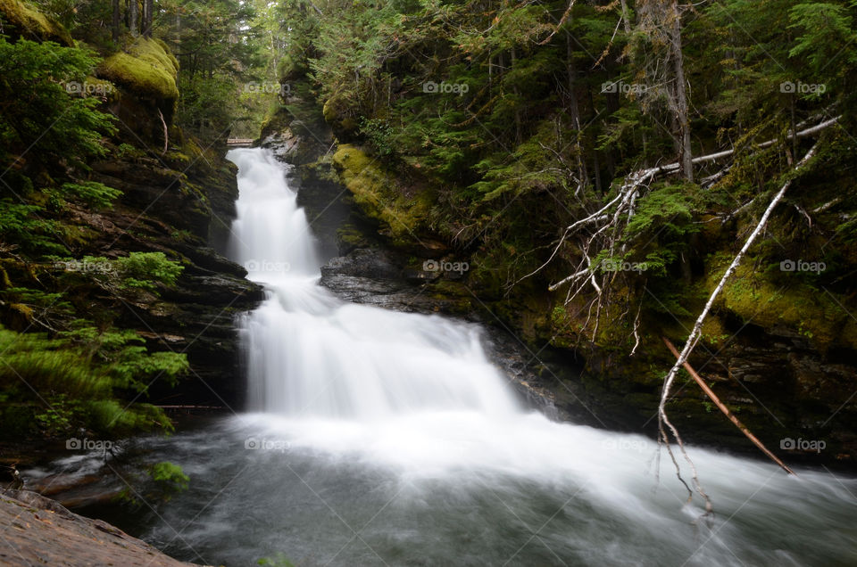 Long exposure of a small Canadian waterfall in the forest