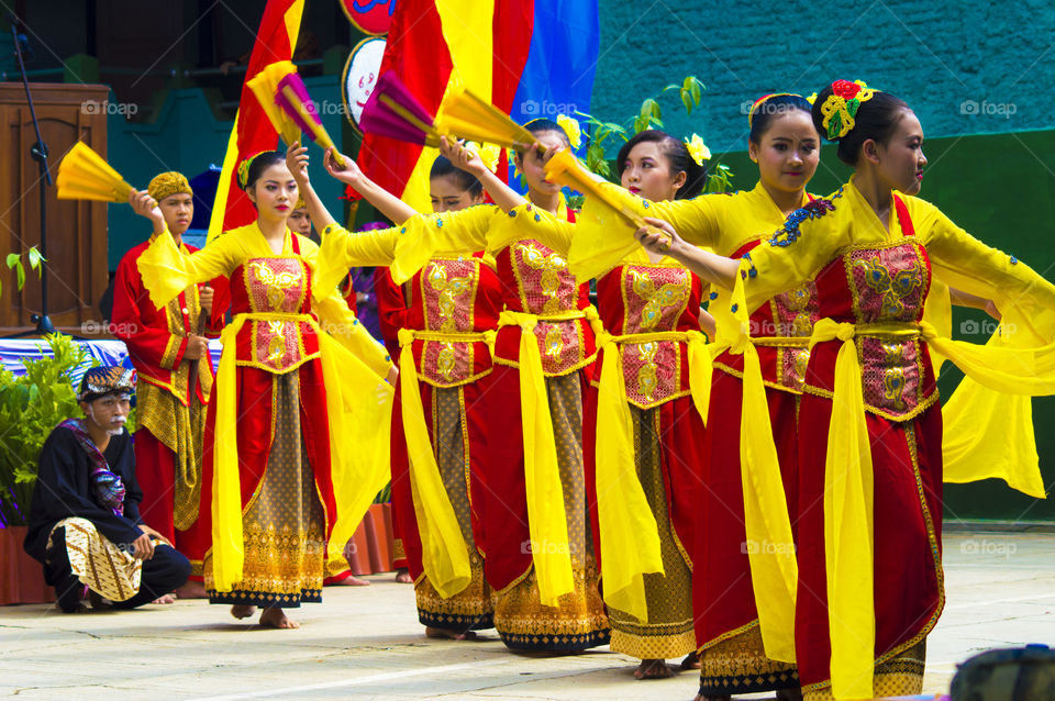 Asian woman dancing in traditional clothing